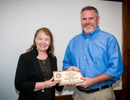 Brenda Decker presents 25 years of service awared to Kevin Smith 